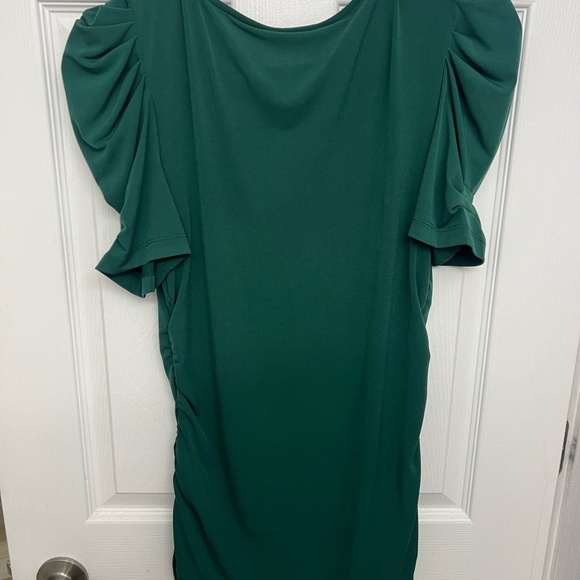 Puff/ruffle sleeve touched top in true emerald green. - Picture 2 of 3